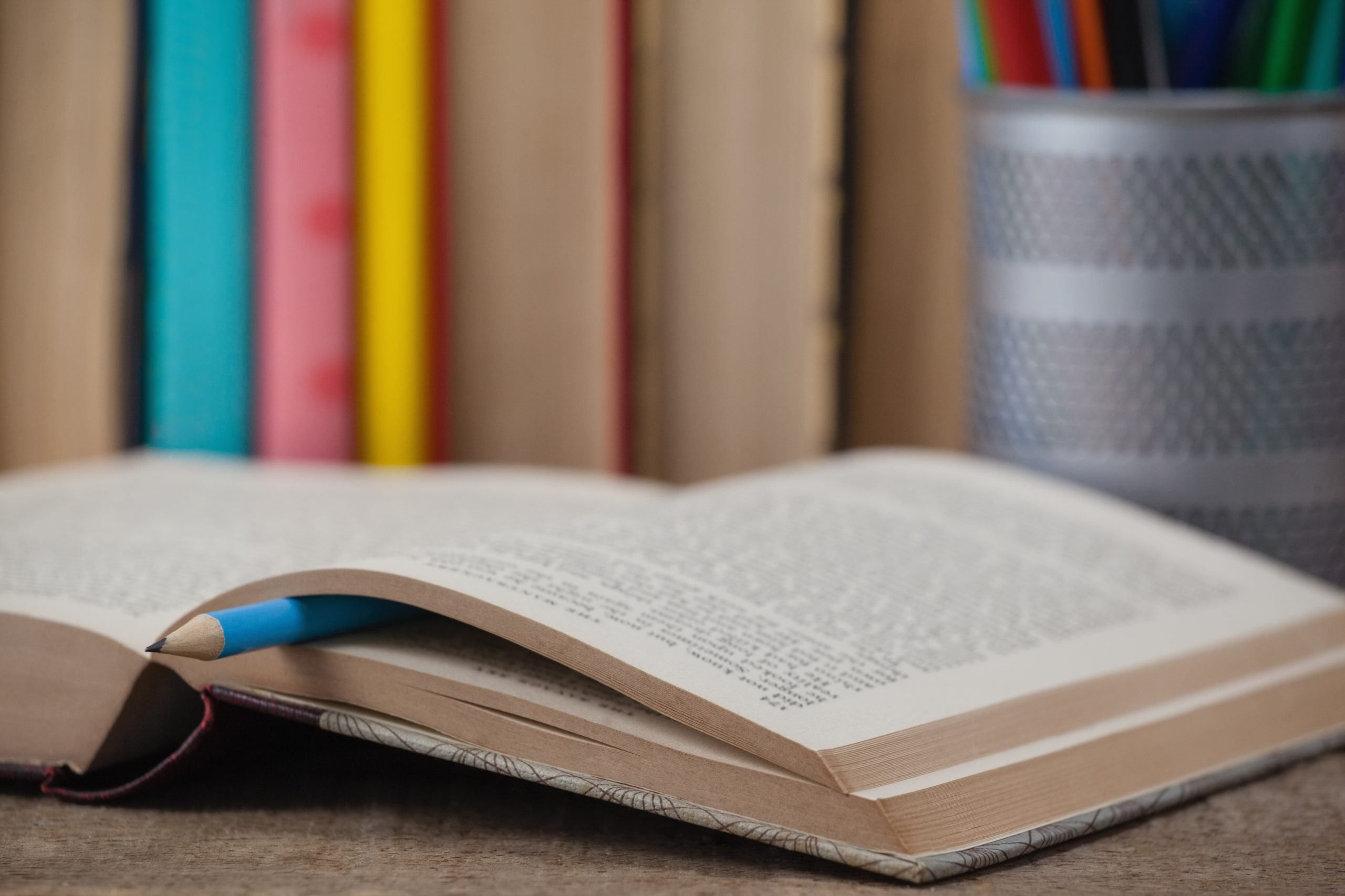 Book on wooden background